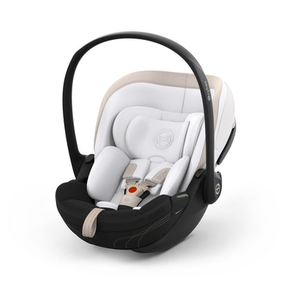 Cybex cloud s car seat in off white colour, with recline function.
