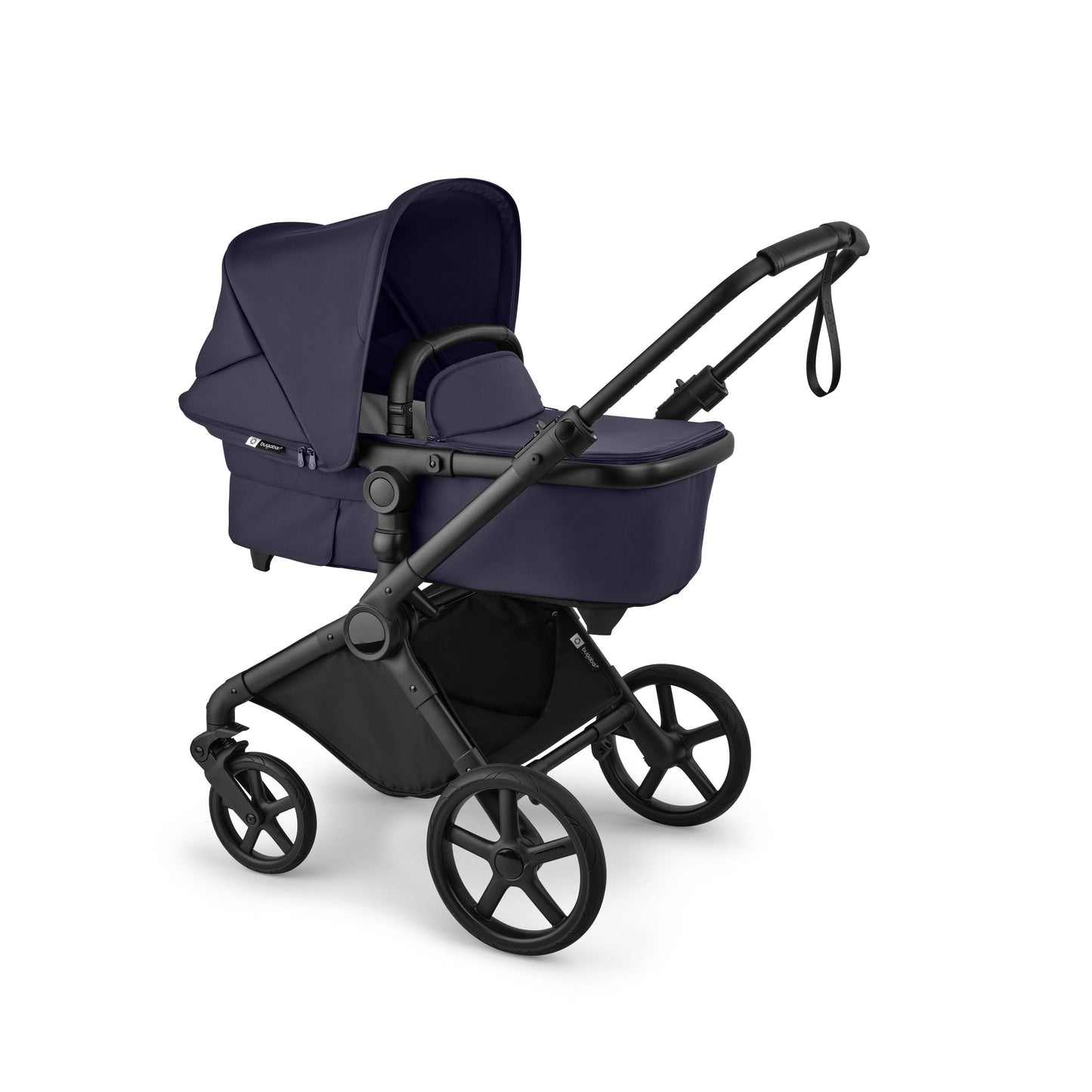 Bugaboo Cub stroller and carrycot in deep indigo blue with black chassis.