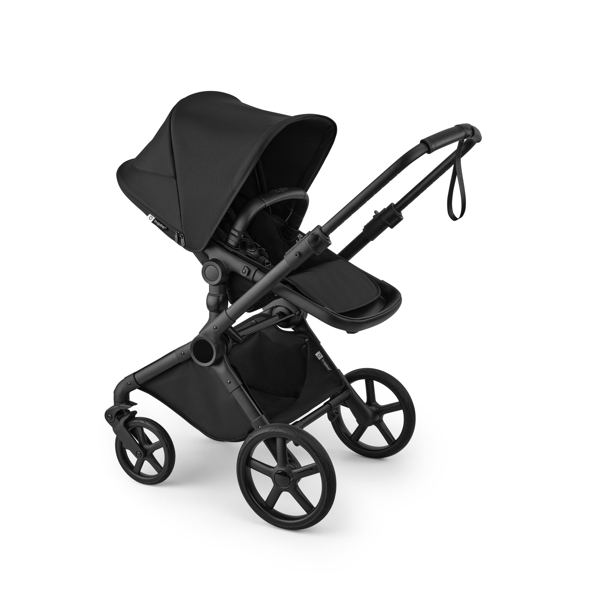 Bugaboo Cub stroller and carrycot in heritage black with black chassis.