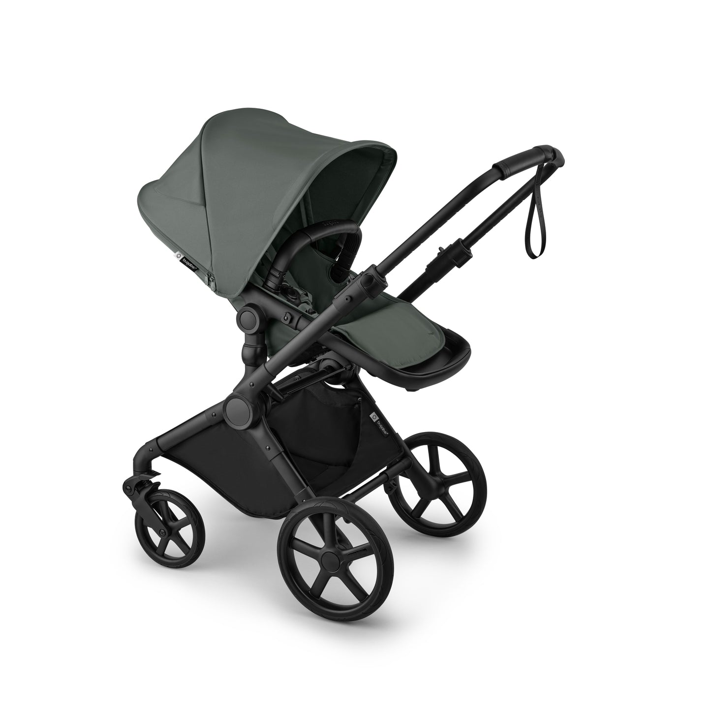 Bugaboo Cub stroller and carrycot in forest green with black chassis.