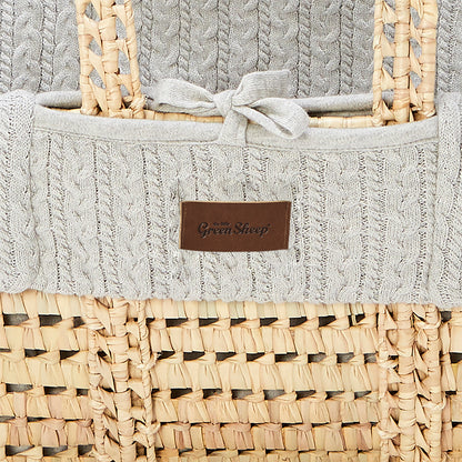 Dove moses basket with a close up view of stitching