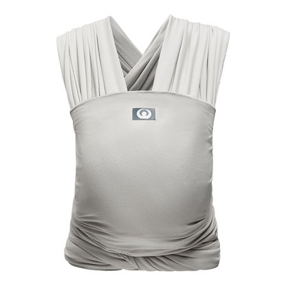 A baby carrier featuring a comfortable organic cotton wrap for secure and stylish baby carrying in silver grey colour.
