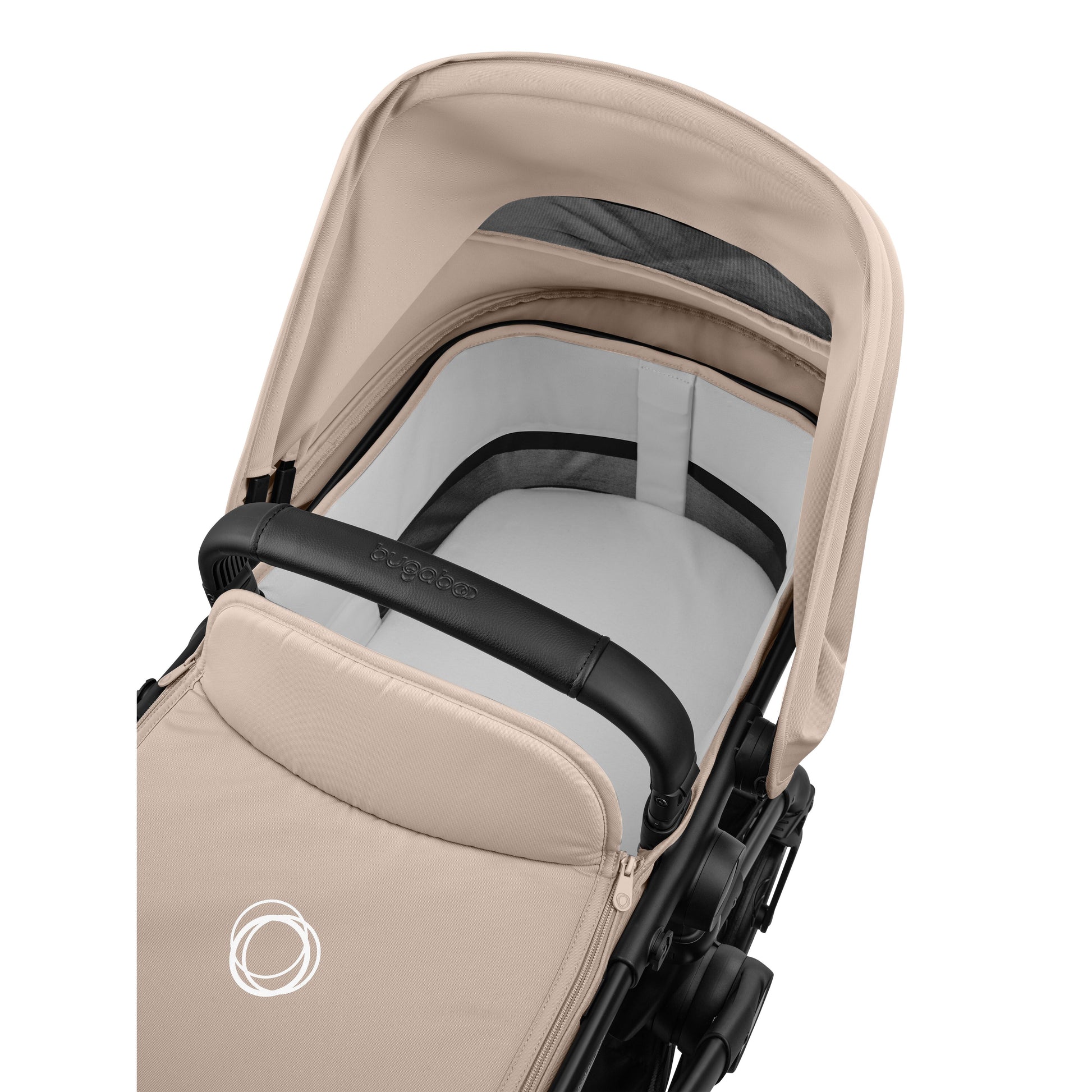 Bugaboo Cub stroller and carrycot in desert taupe beige with black chassis.