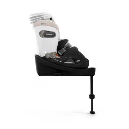 Cybex anoris Si car seat with airbag in off white style colour, with isofix base attatched.
