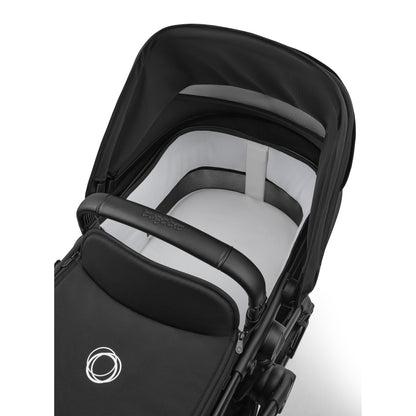 Bugaboo Cub stroller and carrycot in heritage black with atonB2 car seat & base.