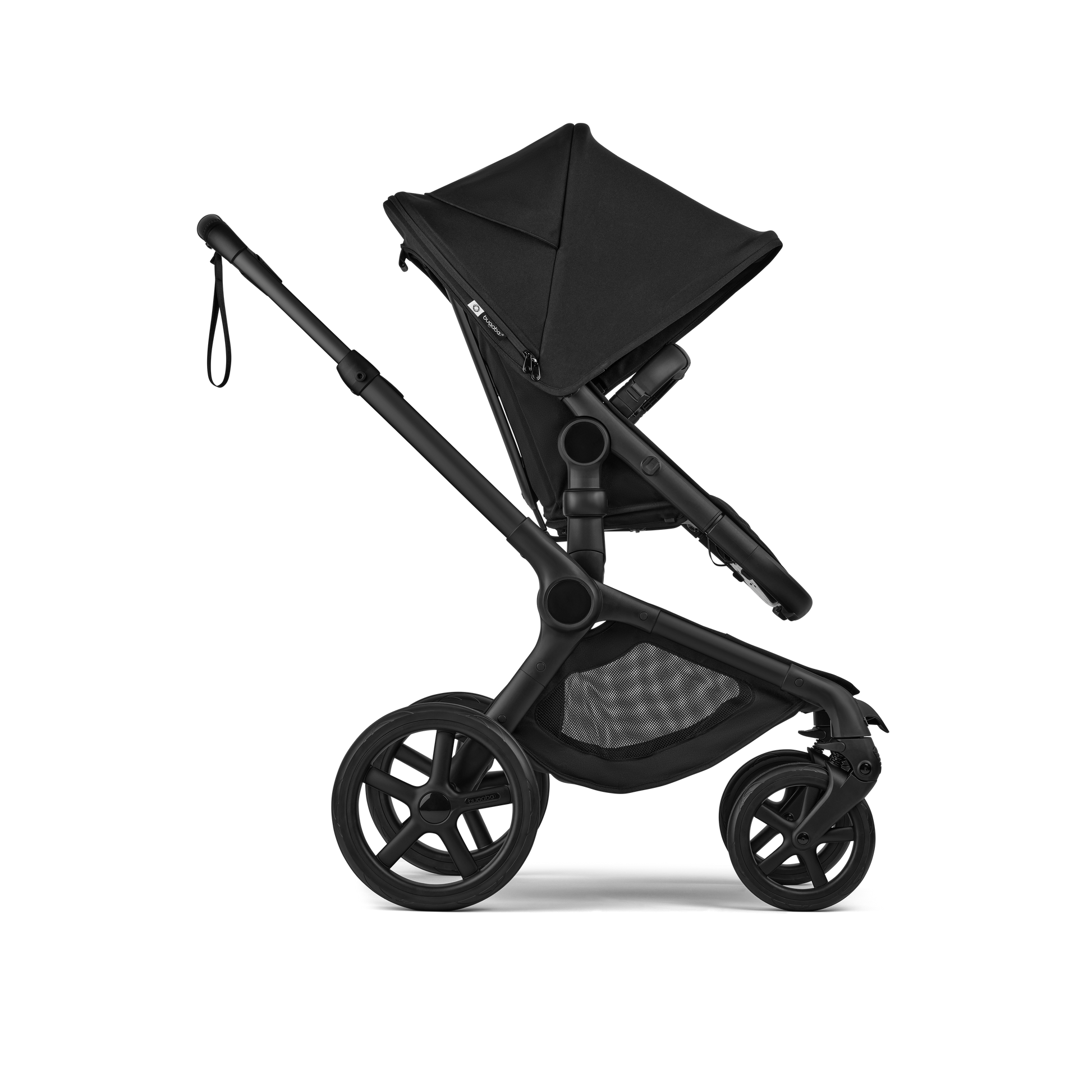 The Heritage Black Bugaboo Fox5 pushchair, equipped with a seat and carrycot fabric, offers a compact fold for all-terrain use.