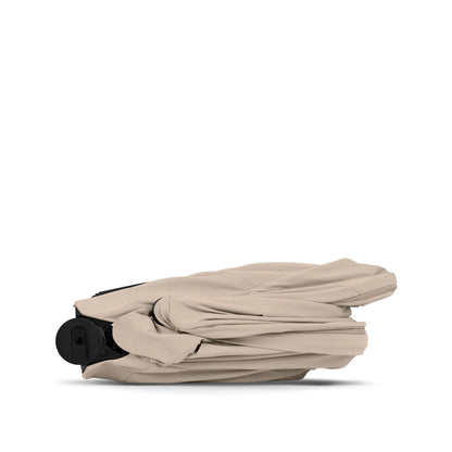 Cybex Priam Comfort combo in cozy beige colourway and matt black chassis complete with footmuff.