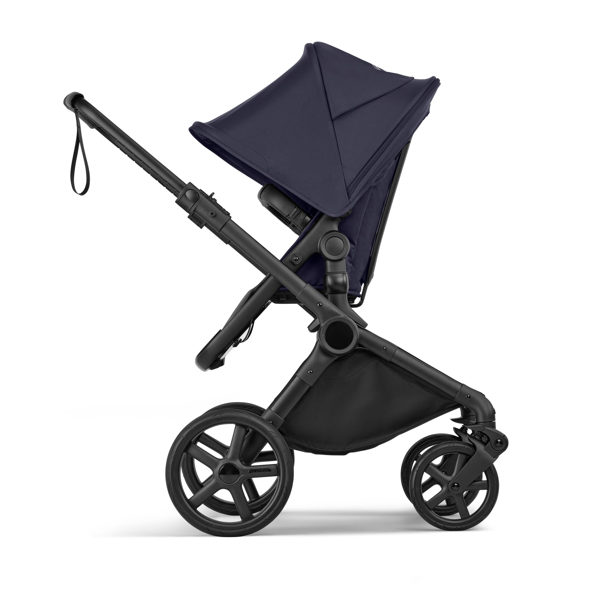 Bugaboo Cub stroller and carrycot in deep indigo blue with black chassis.