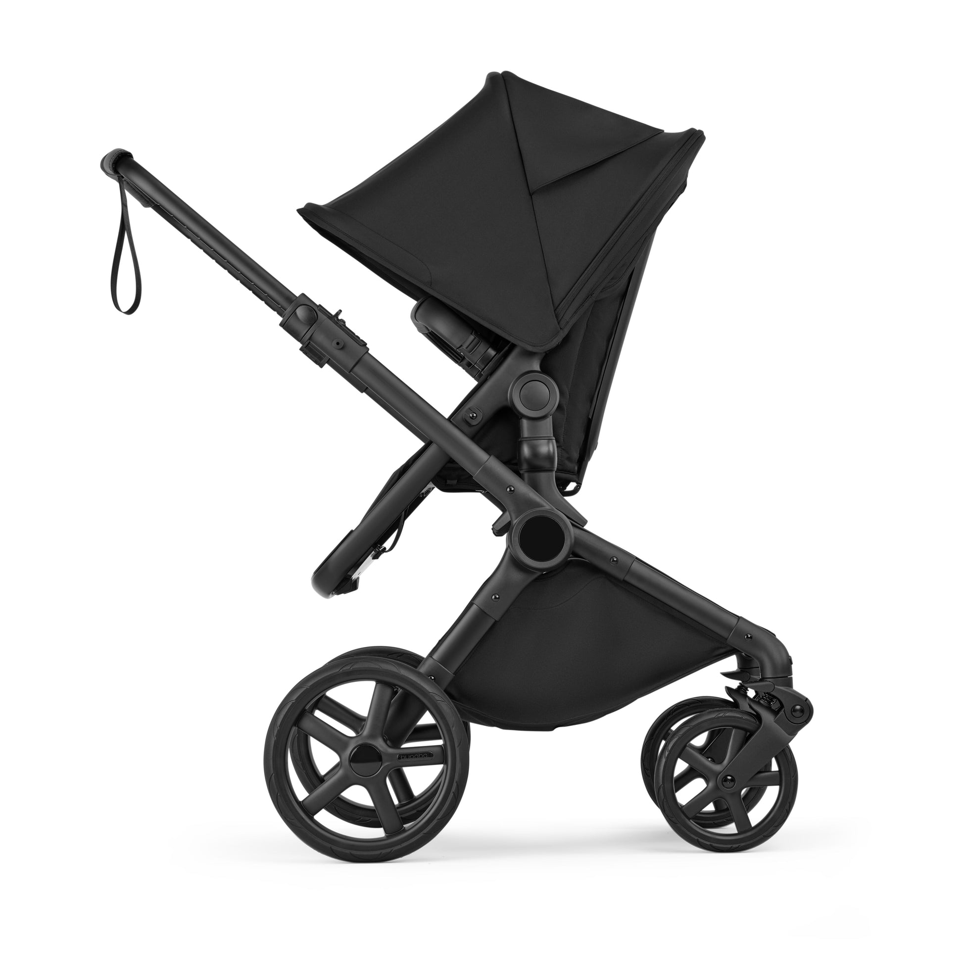 Bugaboo Cub stroller and carrycot in heritage black with black chassis.