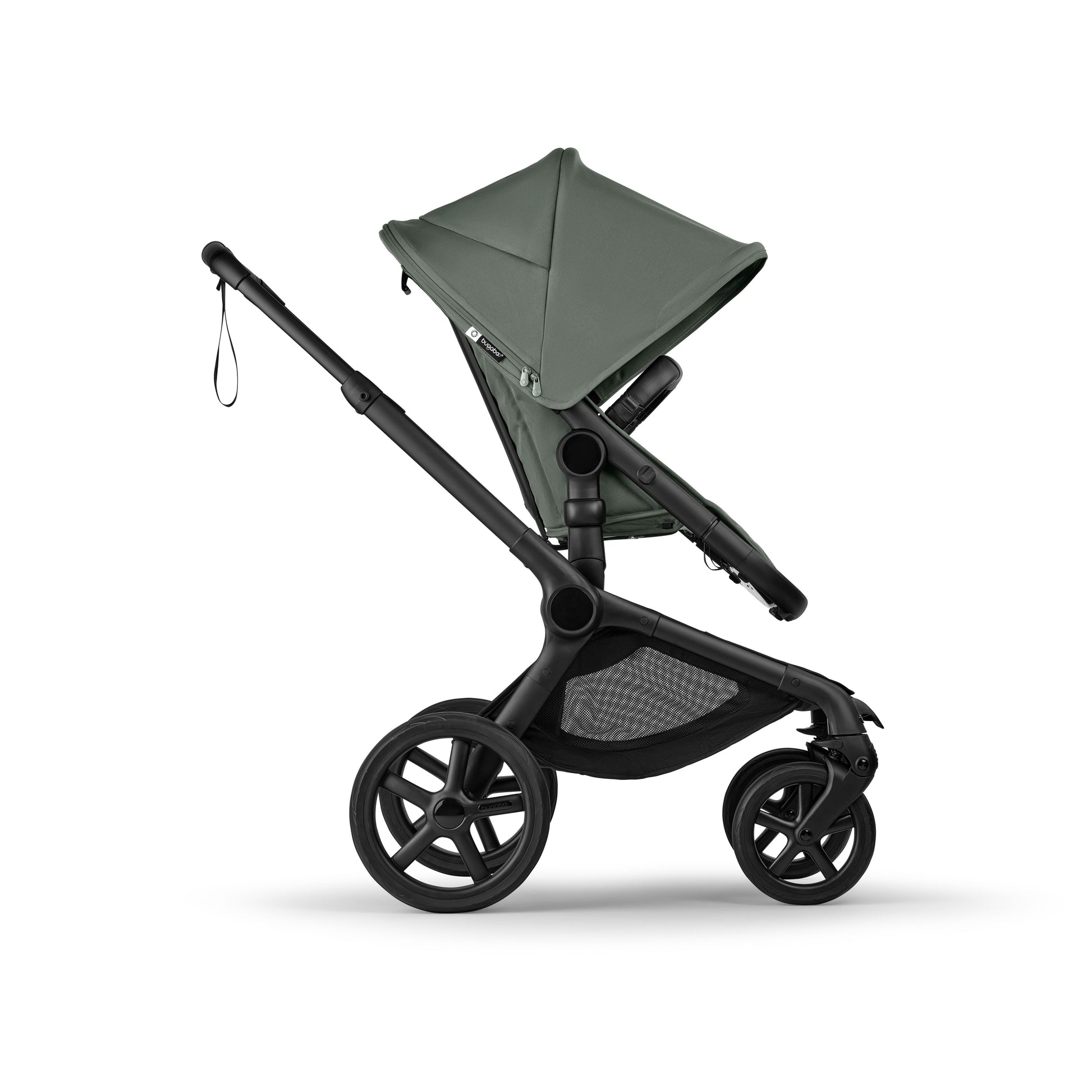 The foreset green Bugaboo Fox5 pushchair, equipped with a seat and carrycot fabric, offers a compact fold for all-terrain use.