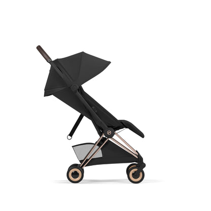 Cybex Coya Pushchair and carrycot in sepia black colourway on a rose gold chassis.