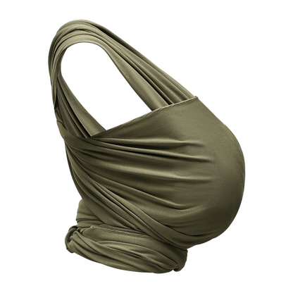 A baby carrier featuring a comfortable organic cotton wrap for secure and stylish baby carrying in forest green colour.