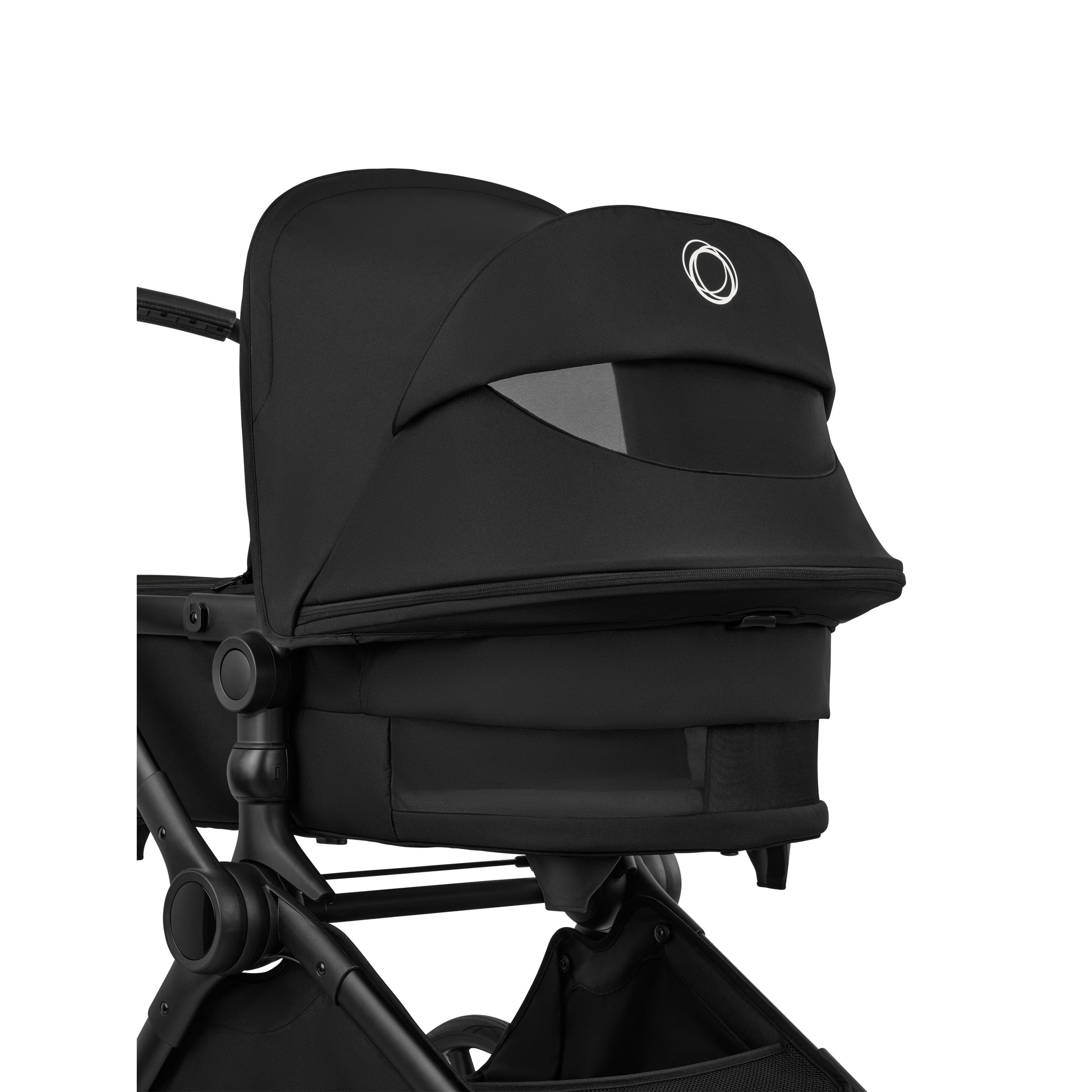 Bugaboo Cub stroller and carrycot in heritage black with black chassis.