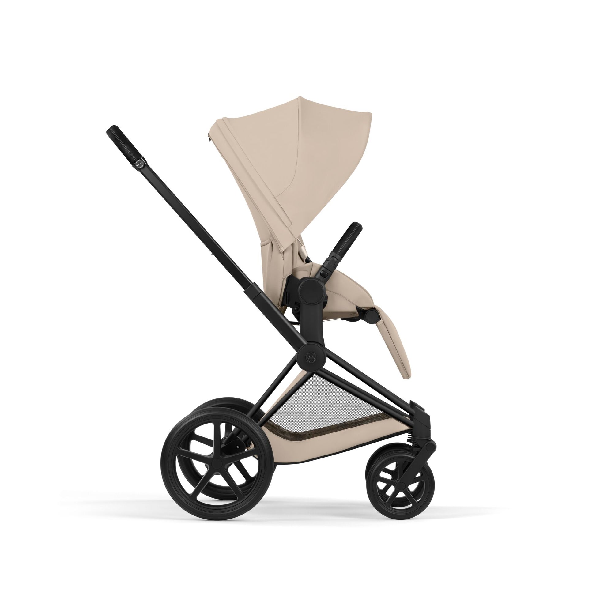 Cybex Priam Comfort combo in cozy beige colourway and matt black chassis complete with footmuff.