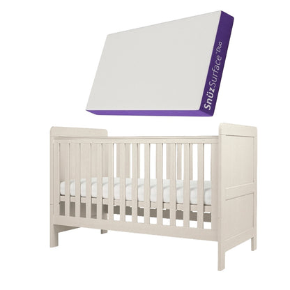 Cot bed with adjustable heights in stone colour, complete with snuz duo mattress.