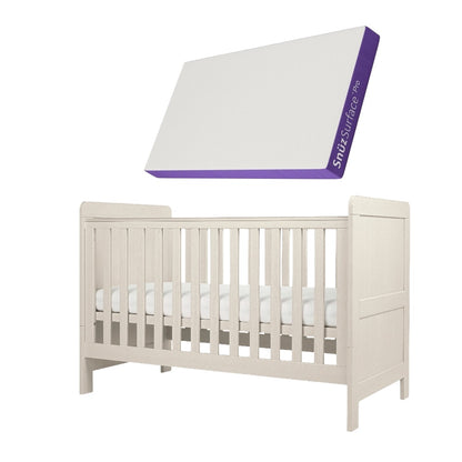 Cot bed with adjustable heights in stone colour, complete with snuz pro mattress.