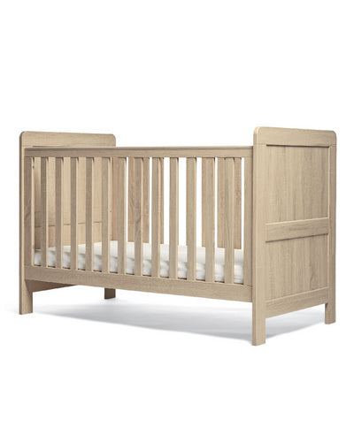 Mamas & Papas Atlas Cot Bed featuring a light oak design.