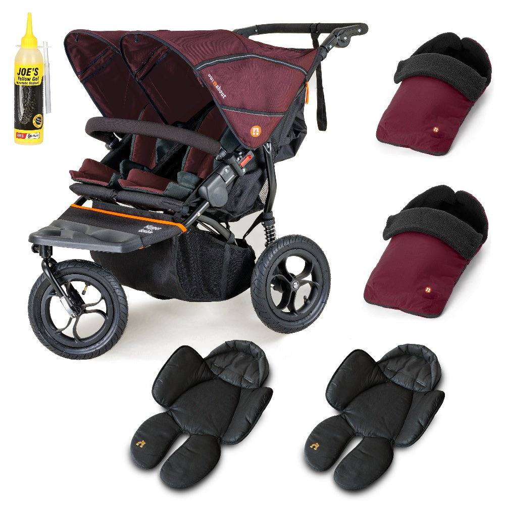 Out N About double nipper in bramble berry red with 2 footmuffs, and 2 newborn inserts.