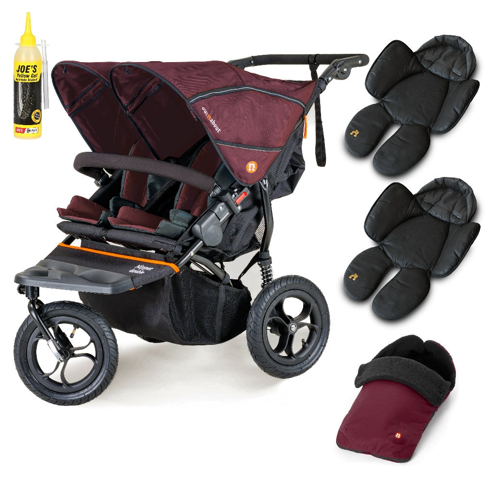 Out N About double nipper in bramble berry red with 1 footmuff, and 2 newborn inserts.