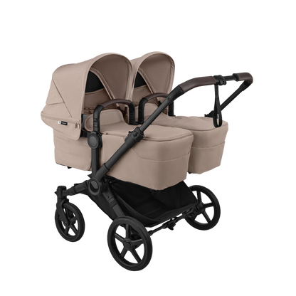 Donkey twin pushchair in desert taupe beige with matching accessories and atonB2 car seats and bases