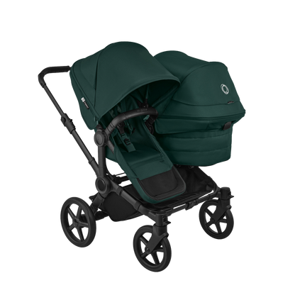 Bugaboo donkey double pushchair and accessories in fern green.