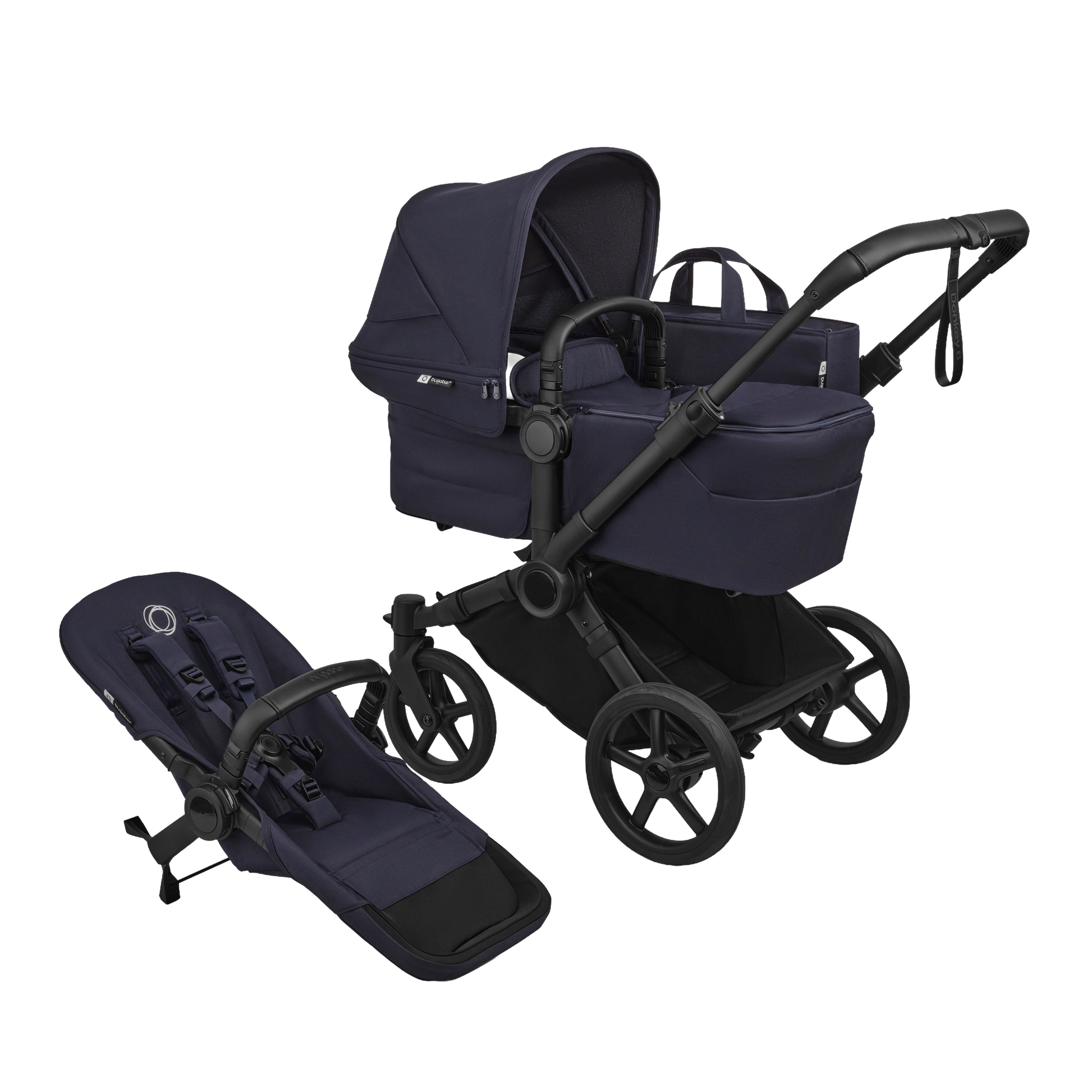 Donkey single pushchair and carrycot bundle in deep indigo navy with accessories and clout car seat and base.
