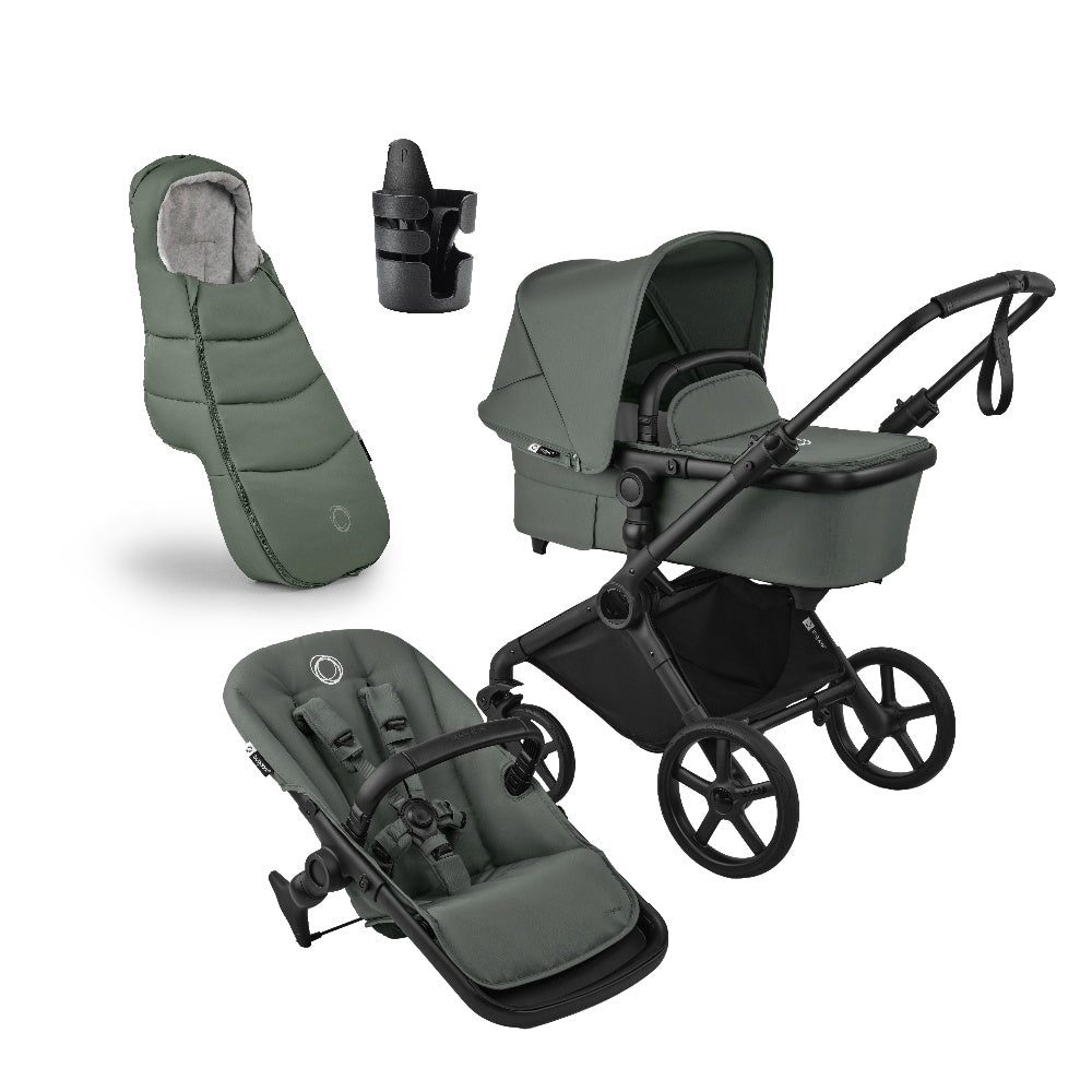 Cub pushchair in forest green with matching accessories.