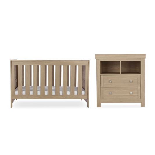 CuddleCo Burford 2 piece nursery furniuter set in an oak finish. Mattress not included.