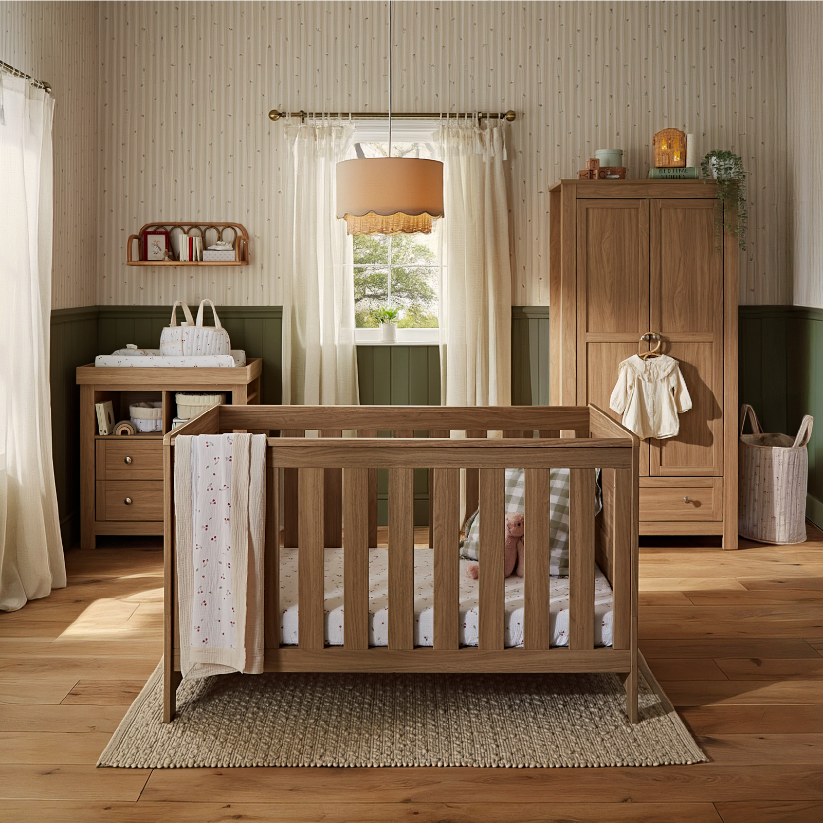 CuddleCo Burford 3 piece nursery furniture set in an oak finish.
