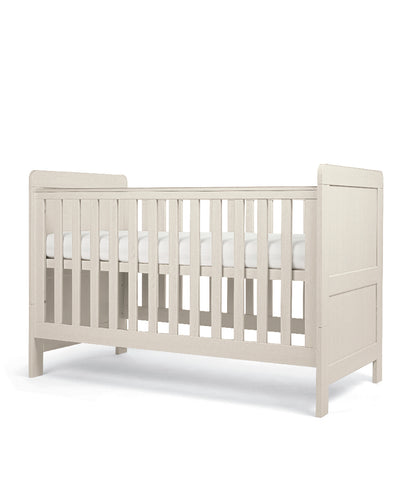 Cot bed with adjustable heights in stone colour, complete with snuz duo mattress.