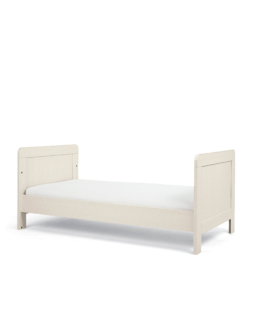 Cot bed and dresser with 3 drawers in stone colour.