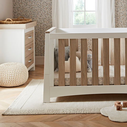 ADA cotbed and dresser in a nursery