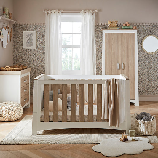 ADA cotbed, dresser and wardrobe within a nursery