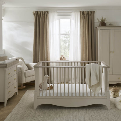 clara cashmere cotbed and dresser and wardrobe in a nursery