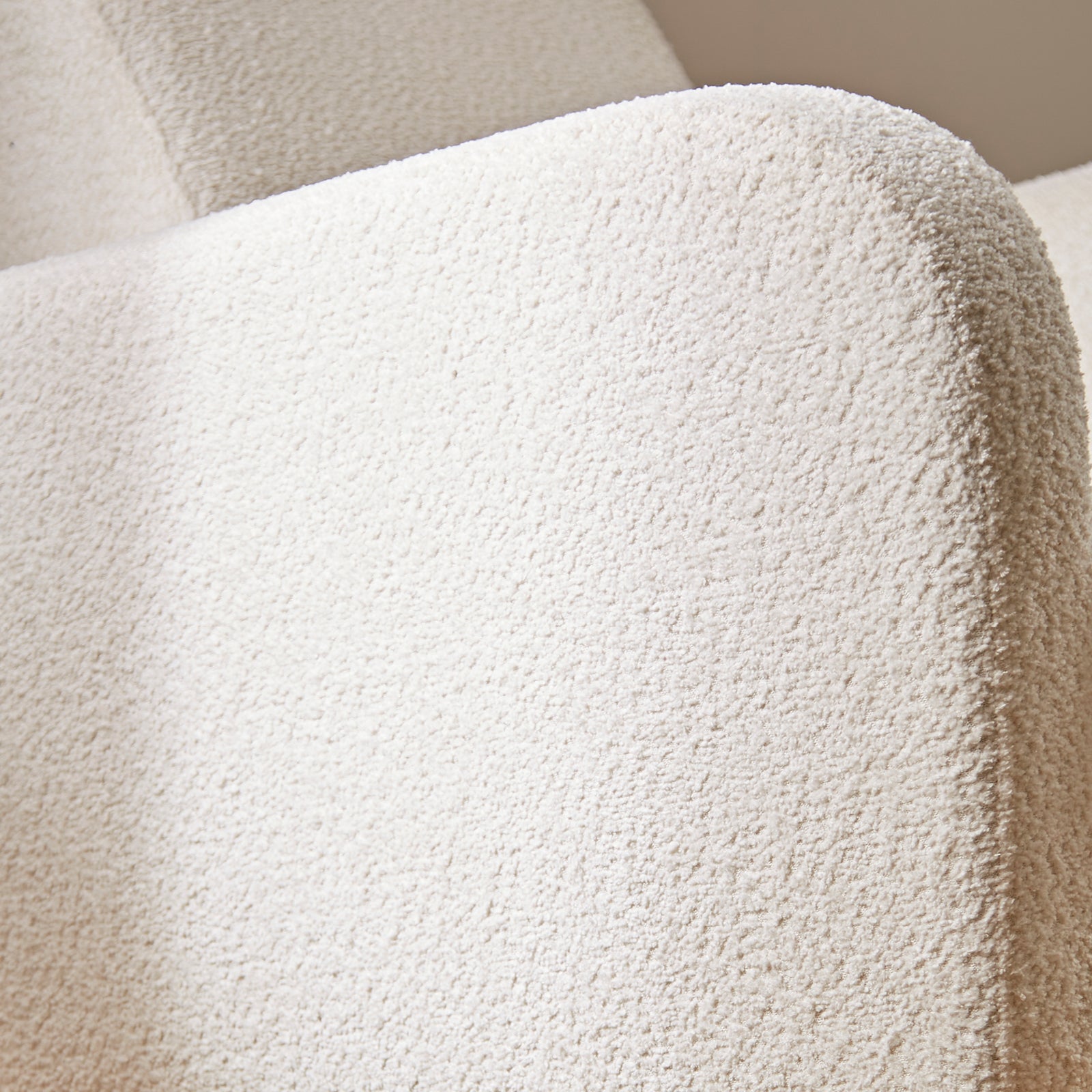 CuddleCo Etta nursing chair in off white colour way with rocking feet.