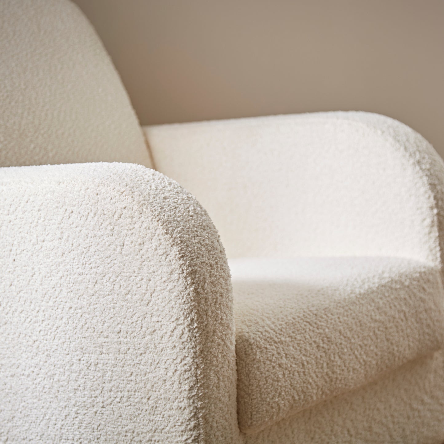 CuddleCo Etta nursing chair in off white colour way with rocking feet.