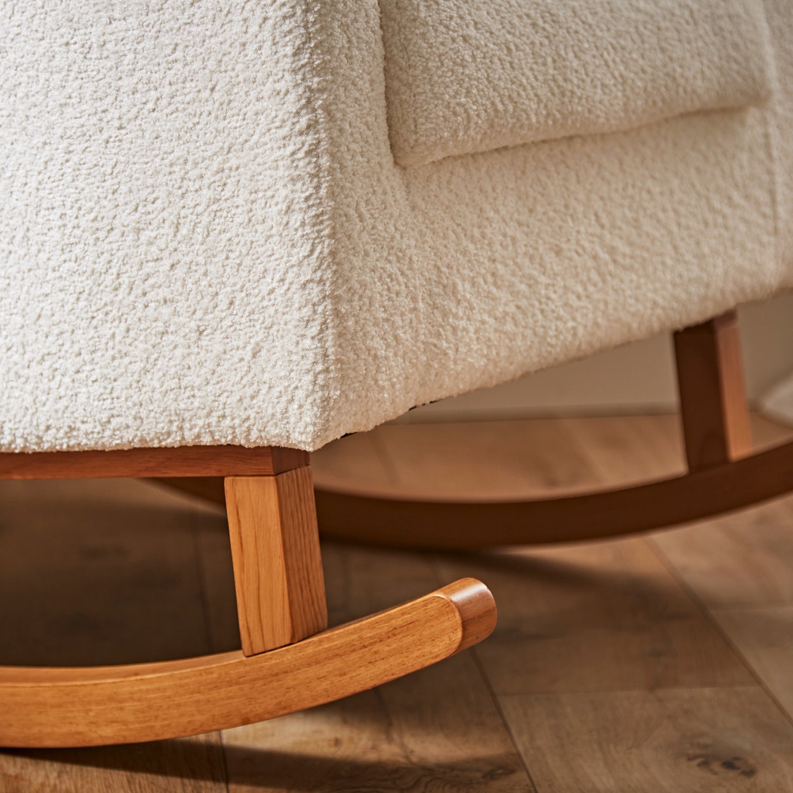 CuddleCo Etta nursing chair in off white colour way with rocking feet.