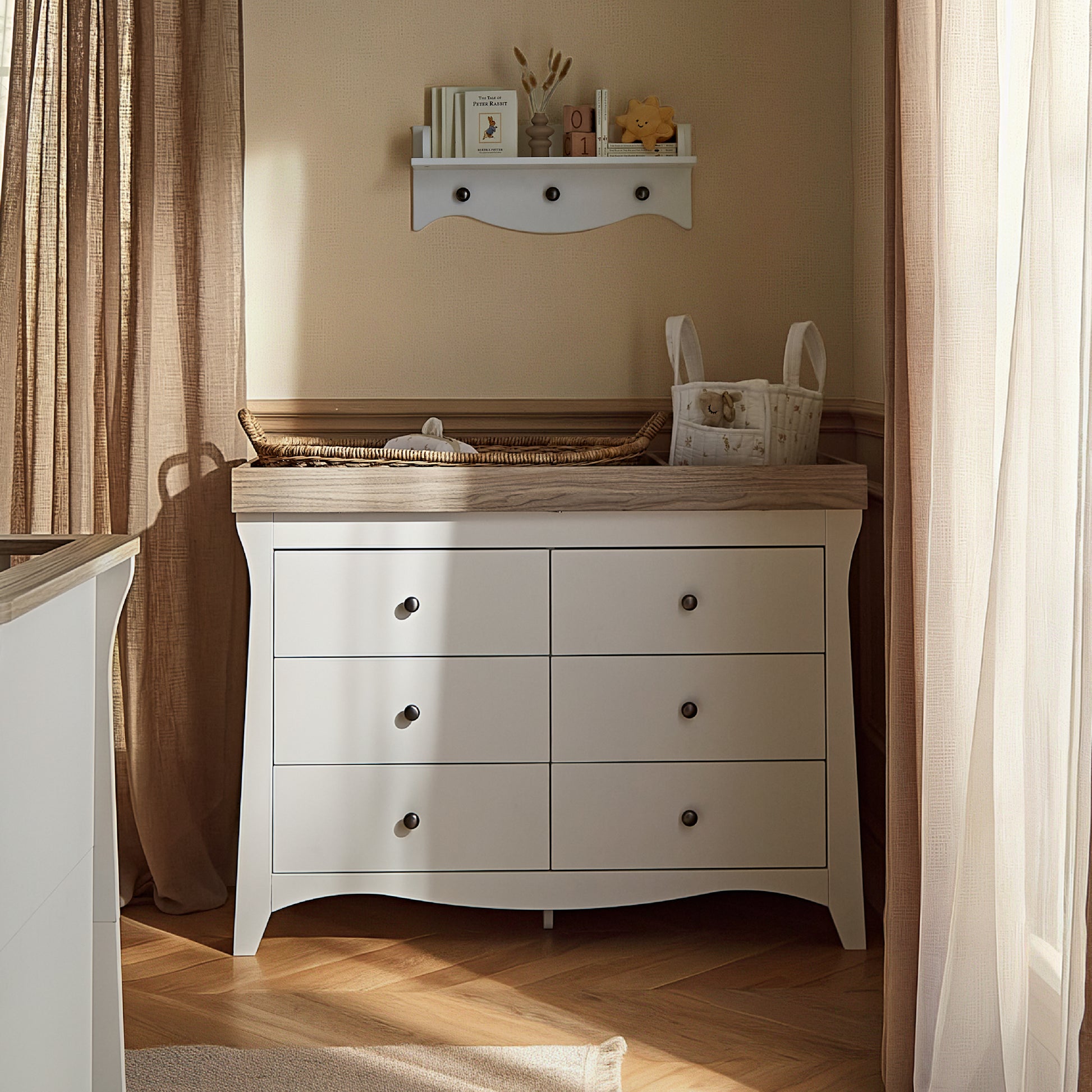 CuddleCo 6 drawer wide dresser with changing top, in white white with ash trim.