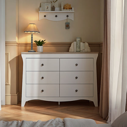 CuddleCo 6 drawer wide dresser with changing top, in white white with ash trim.