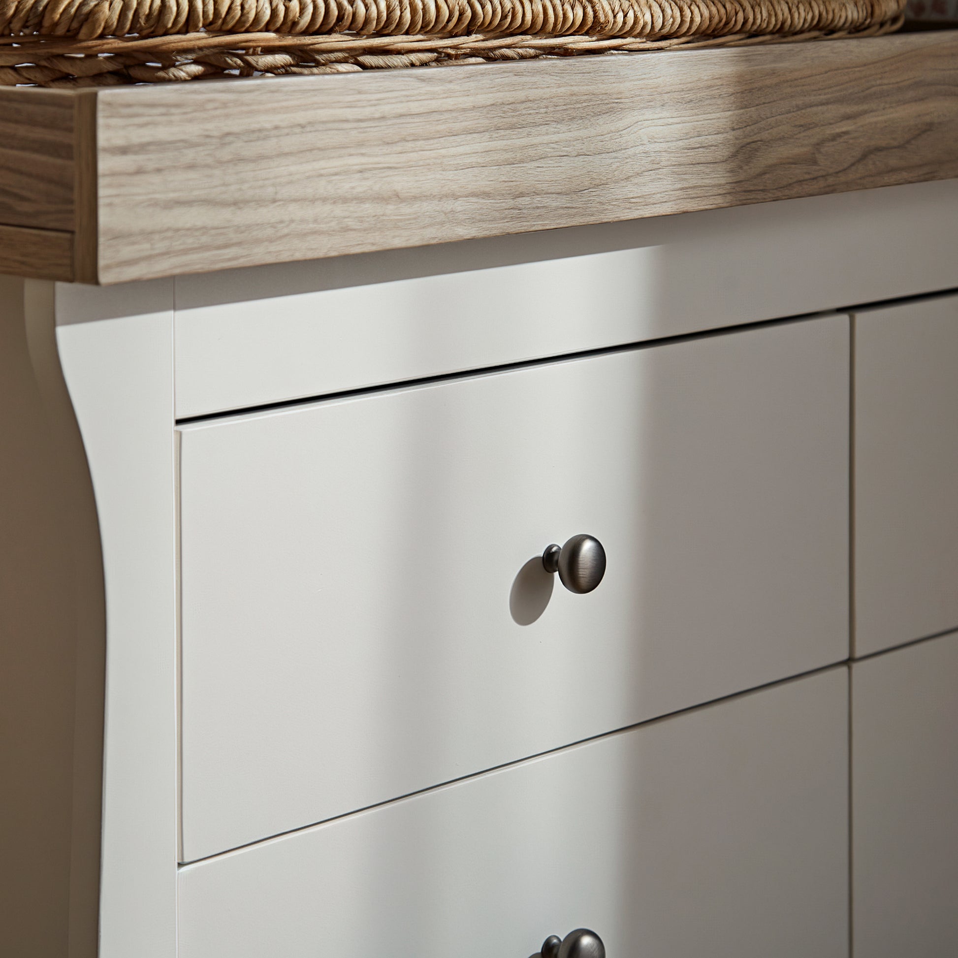 CuddleCo 6 drawer wide dresser with changing top, in white white with ash trim.
