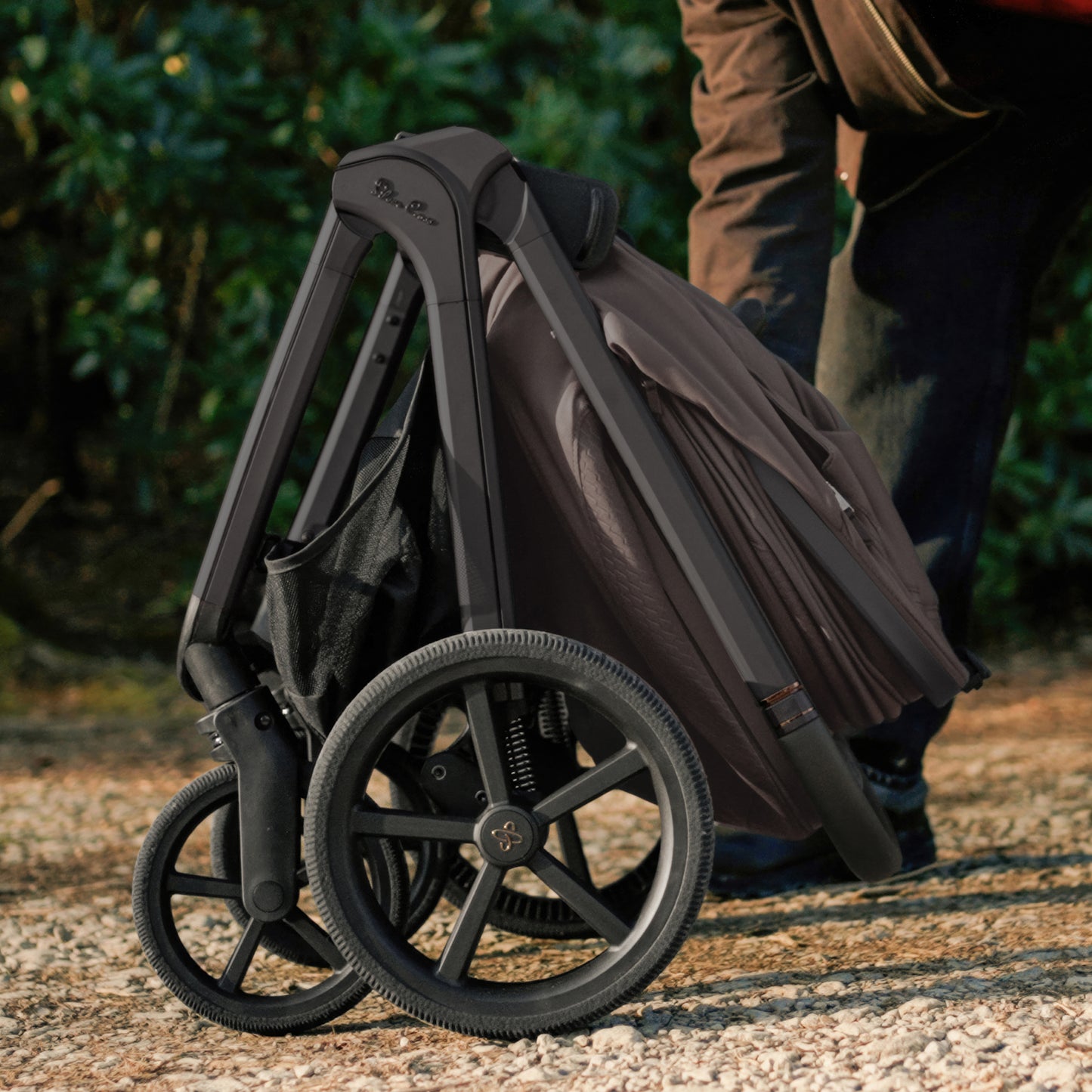 Silver cross cove 2 travel system in chocolate brown with next stage car seat in black.