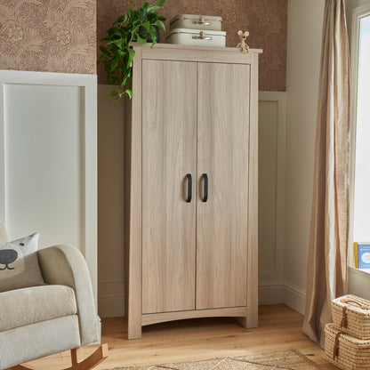 An Isla wardrobe, finished in ash, for a nursery setting.