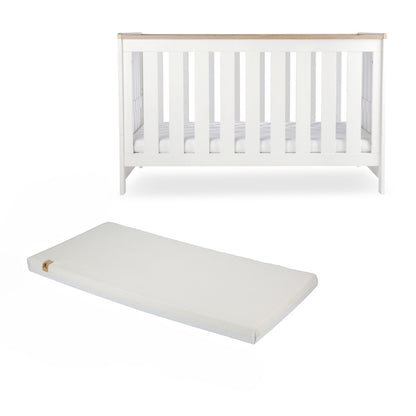 CuddleCo Burford cot bed in white with oak trim, with lullaby mattress.
