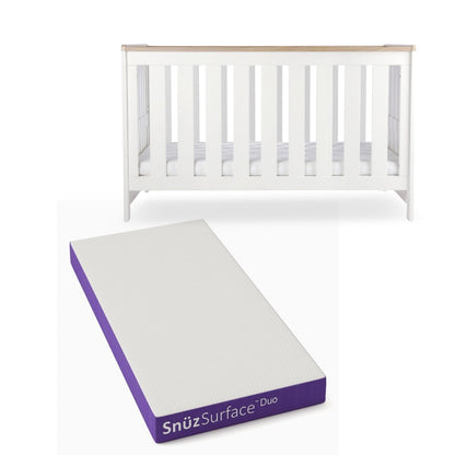 CuddleCo Burford cot bed in white with oak trim, with snuz duo mattress.