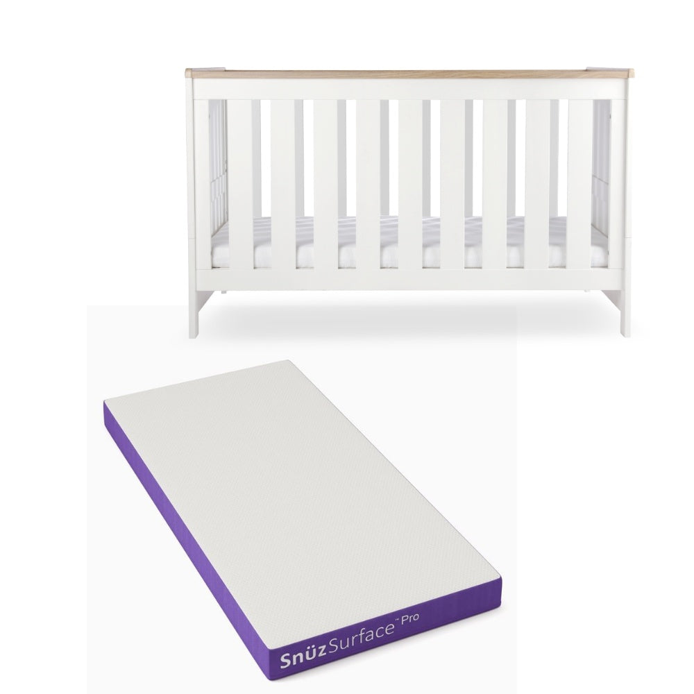 CuddleCo Burford cot bed in white with oak trim, with snuz pro mattress.