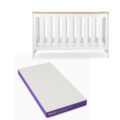 CuddleCo Burford cot bed in white with oak trim, with snuz pro mattress.
