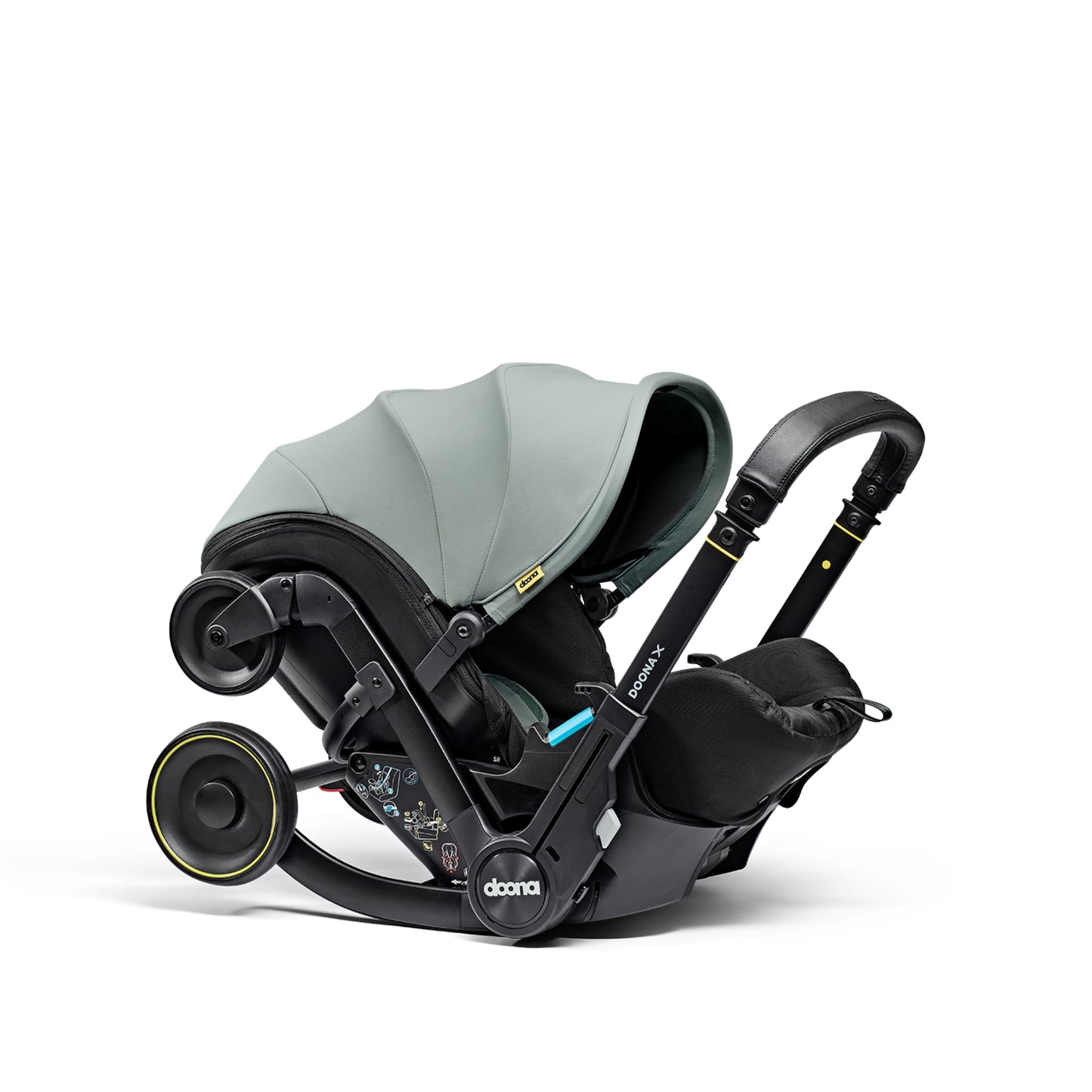 A stylish Doona X car seat in dusty sage, for a modern infant safety solution 