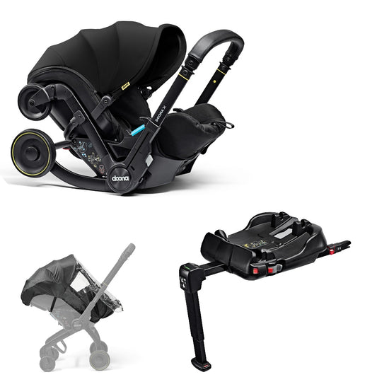 A stylish Doona X car seat in nitro black, for a modern infant safety solution with a Doona base and rain cover 