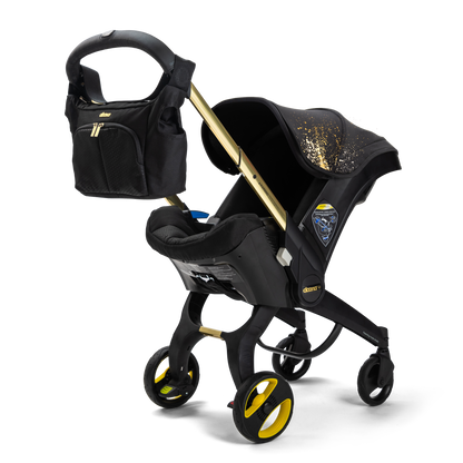 Stroller organiser bag with straps for attaching to pram.