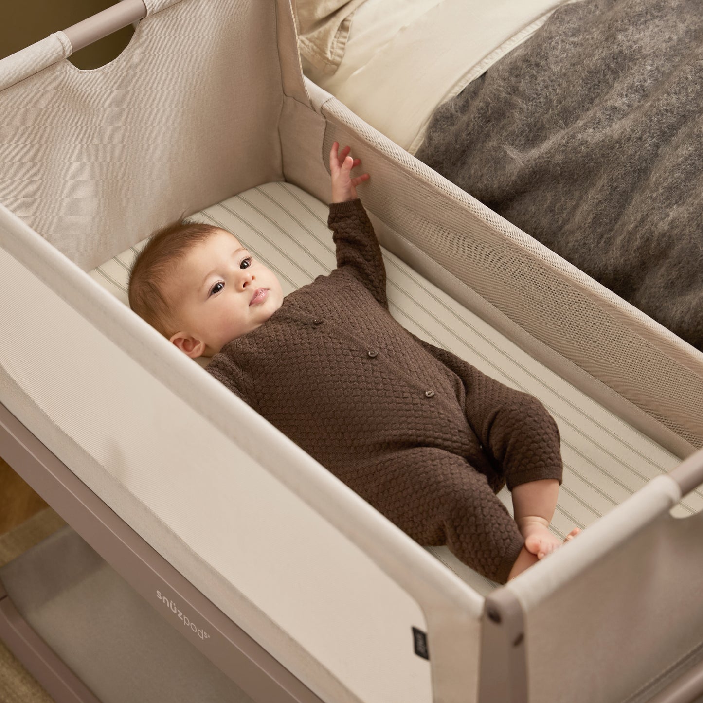 Snuzpod crib sheets in sage green stripe colour.